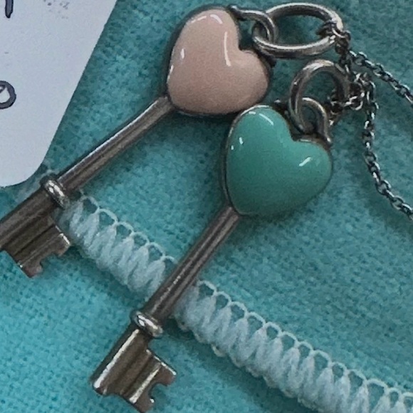 Tiffany & Co. Silver Necklace with Pink and Blue enamel keys. Mini size .